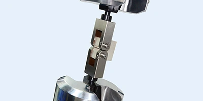 Compact Tension Grips for Fracture Toughness Testing